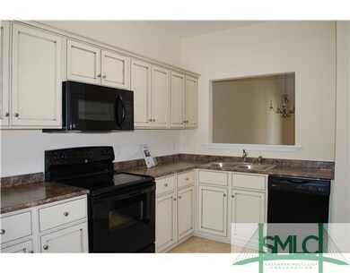 Kitchen. PHOTOS ARE FROM SIMILAR TOWNHOMES BY THE 