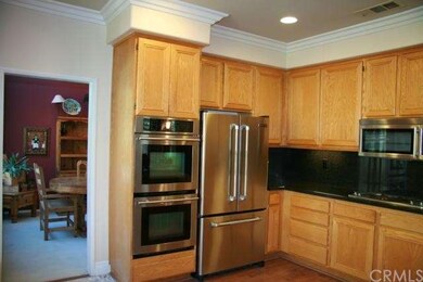 Kitchen looking into formal dining room
