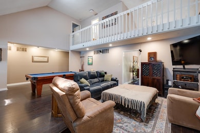 Rich hardwood floors and a fireplace for cold winter nights.