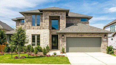 French provincial home featuring roof with shingl