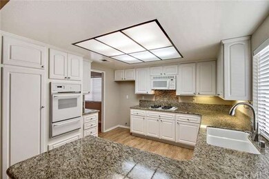 Kitchen with white cabinets