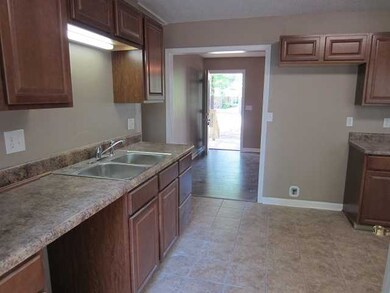 NEW KITCHEN CABINETS, NEW COUNTERTOP, NEW TILE FLO