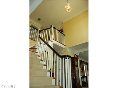 Foyer - Elegant stairway upon entering the home!