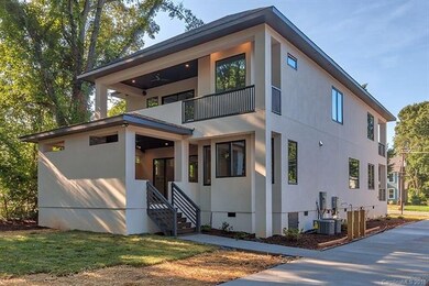Rear View of the property featuring an outdoor liv