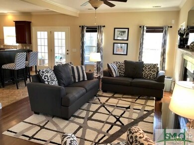The spacious family room is open to both the kitch