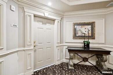 2302 Cedar Village Blvd unit 302, East Brunswick, NJ 08816 - photo 3