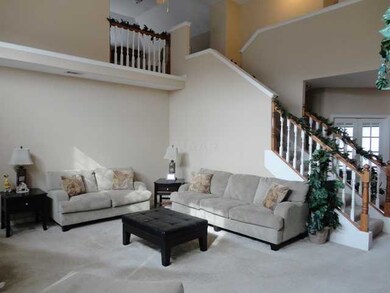 Huge Great Room with View of Stairs to Second Leve