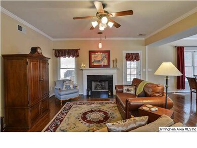 Light and bright family room with gas log fireplac