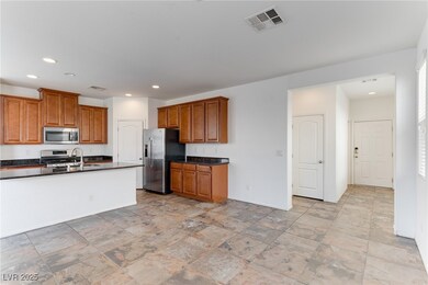 Kitchen with appliances with stainless steel finis