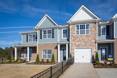 Brick and Stone!!!   1 CAR GARAGE!   Photo of model home. 