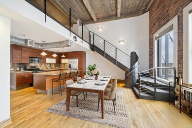 This stunning open-concept loft features a modern