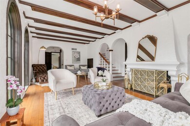 Living/Parlor Room, New Renewal by Anderson windows, original wood detailing, Wood Burning Fireplace