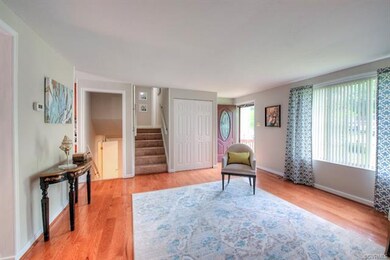 Bright & spacious Living Room has brand new hardwo