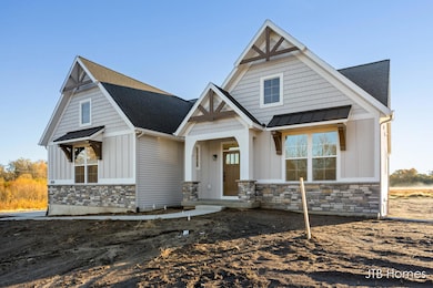 2020 Fallasburg Park Dr NE unit 1, Lowell, MI 49331 - photo 3