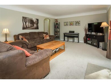 Spacious main floor family room walks out to deck 