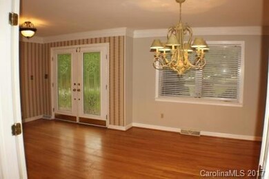 Beautiful wood floors and crown molding in the Dining room.