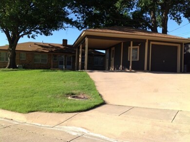 Spring Photo of Garage & Carport