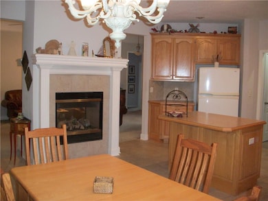 Kitchen with see-through fireplace.