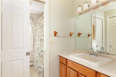 Single vanity bath with pocket door...