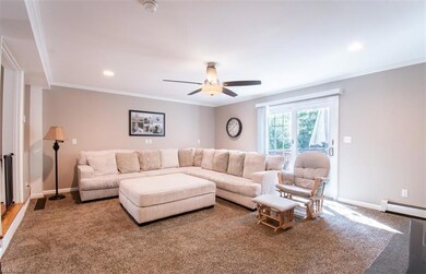 Step down family room with sliding glass doors