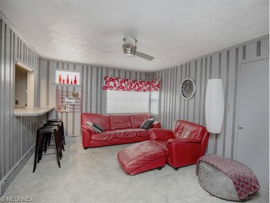 Den is a great room to hang out - wet bar, new car