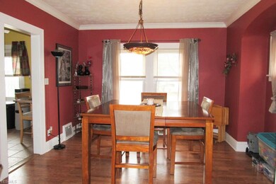 Dining room with crown molding.