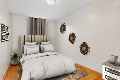 Bedroom with hardwood floor