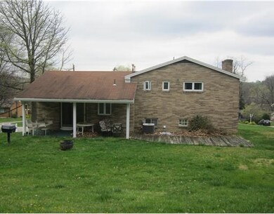 Exterior Back. large covered patio and a 23x10 dec