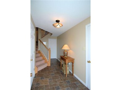 Entry/Foyer. An inviting entry with ceramic tile f