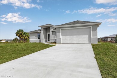 View of front of home featuring a garage and a fro