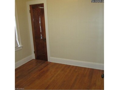 MASTER BEDROOM WITH HARDWOOD FLOORING