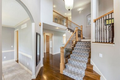 Soaring entry way! Formal dining room to your left