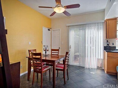 Dining room off of kitchen  Opens to back yard and