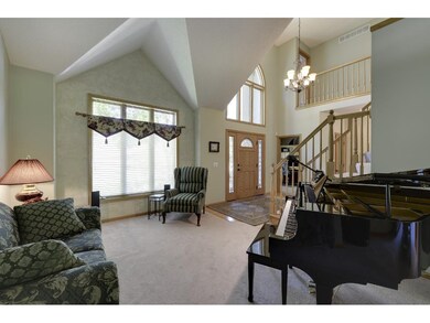 A gracious two story foyer to greet your guests an