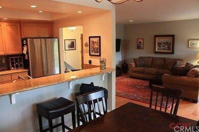 View from the dining area looking toward kitchen a