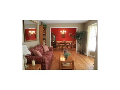 IMMACULATE UPDATED HOME. LIVING ROOM WITH BAY WIND