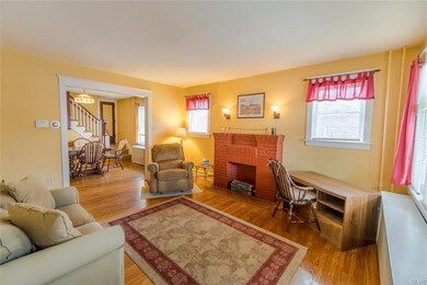 Bright living room with ornamental fireplace