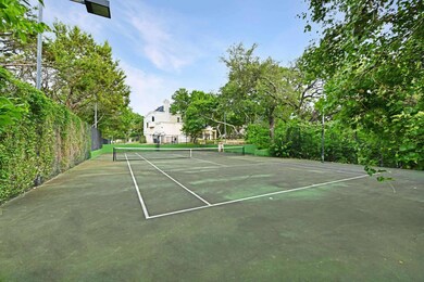 View of tennis court with fence