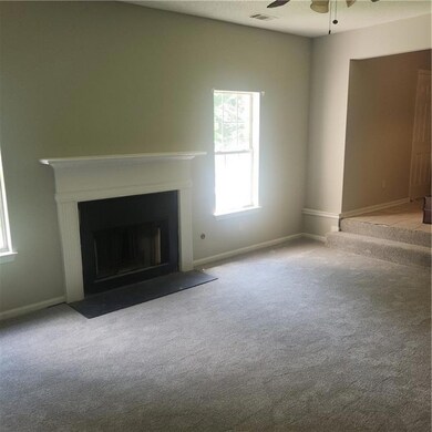 Unfurnished family room with light carpet, ceiling