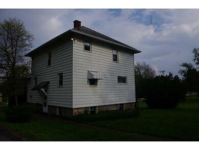 Exterior Back. Side door allows easy access from y