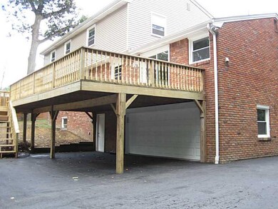 Exterior Back. Spectacular oversized deck off kitc