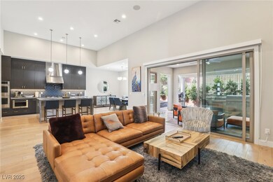Living room featuring light wood-style flooring, a