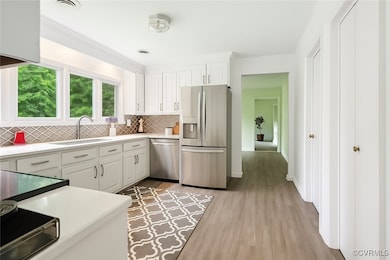 Kitchen with appliances with stainless steel finis