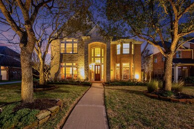 Gorgeous exterior lighting in front and back.