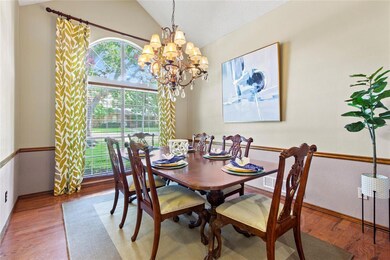 This large open dining area with vaulted beamed ce