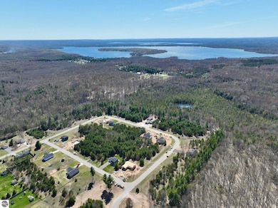 6379 Jeffrey Place unit Lot 33, Grawn, MI 49637 - photo 2