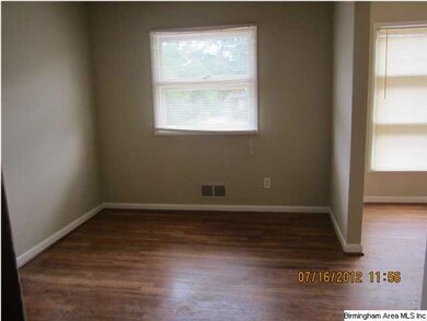 DINING ROOM WITH HARDWOOD FLOORS