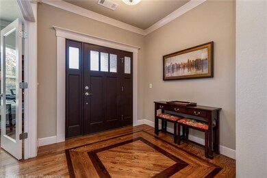 Beautiful inlay at the entry as you great your guests.