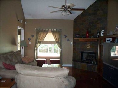 Vaulted celing, hardwood floors and custom gas fir