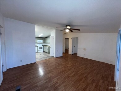 Unfurnished living room with wood finished floors,